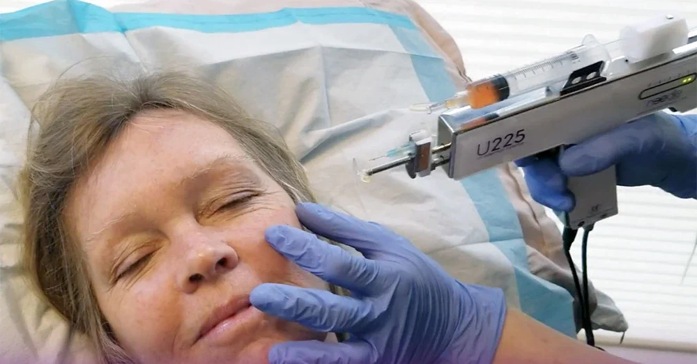 Doctor in a middle -aged woman's Facial Facial