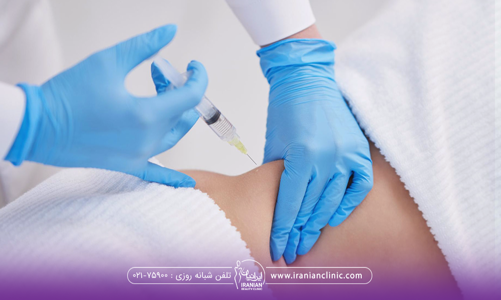 پزشکی که به پهلوی فرد سرنگ زده است